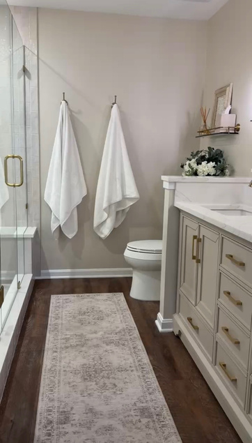 Bathroom after home prep — updated vanity, flooring and finishes