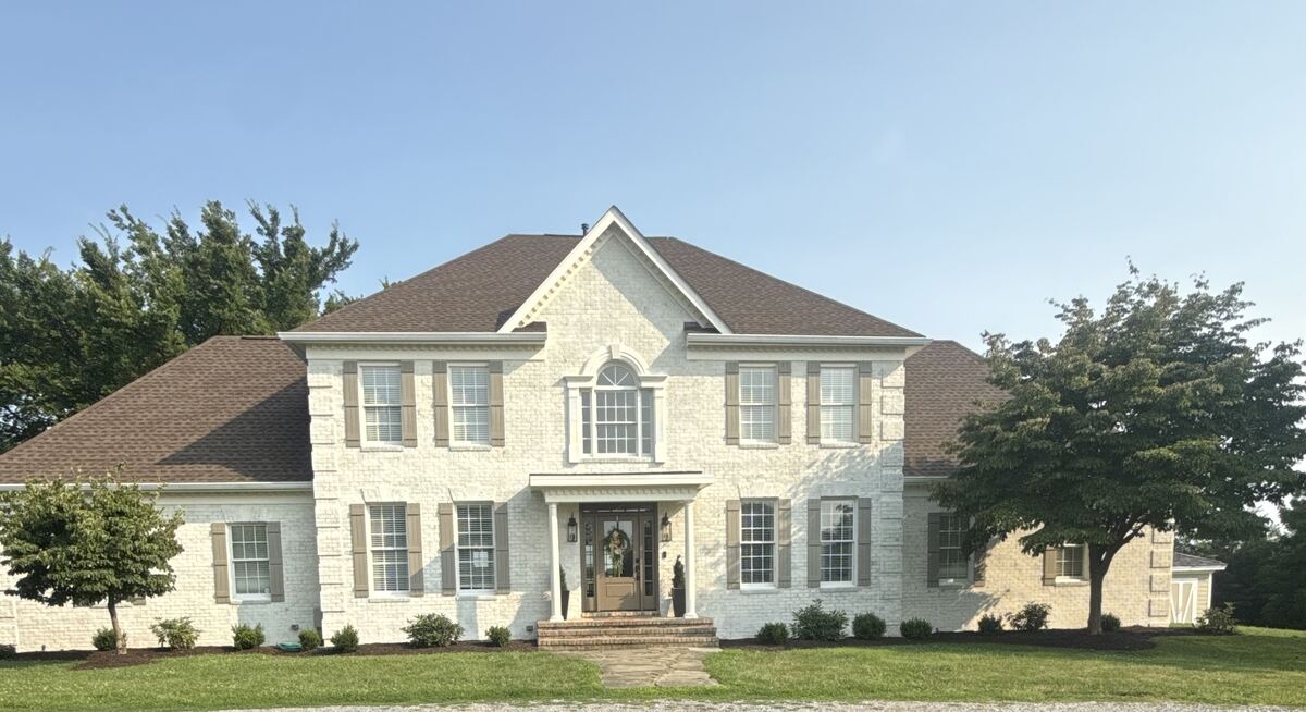 Home exterior after home prep — freshly painted brick and updated curb appeal